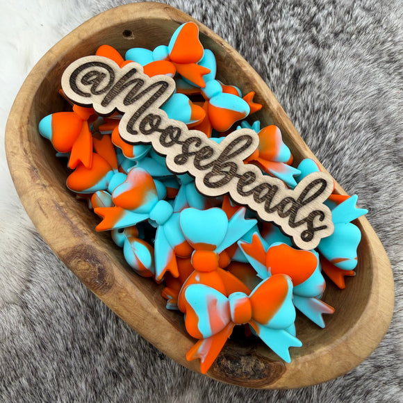 S-1067 Tangerine Dream Bow w/ Tails Silicone Focal EXCLUSIVE