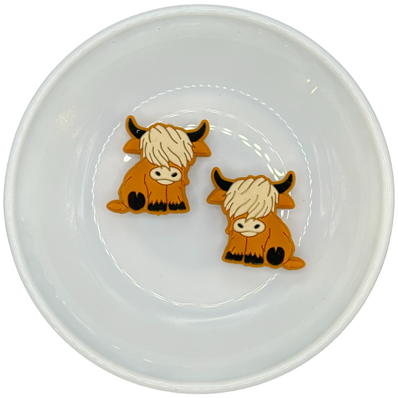 Sitting Highland Cow Silicone Buddy